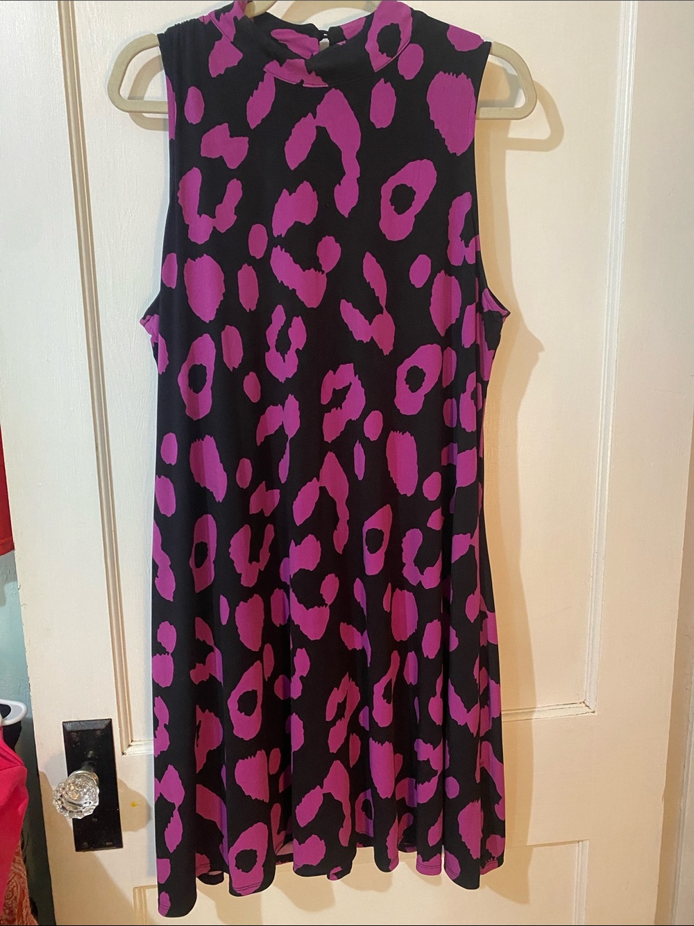 Sleeveless Black Mini Dress with Bold Purple Print